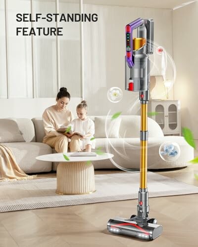 Cordless vacuum cleaner with self-standing feature near a mother and child on a couch.