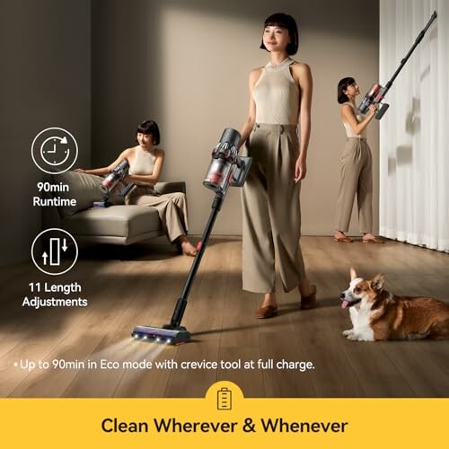 Person using a cordless vacuum cleaner with a dog nearby.