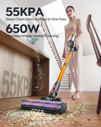 Person using a cordless vacuum cleaner on a floor with scattered cereal.
