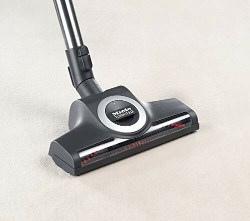 Miele vacuum cleaner head on carpet