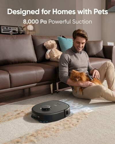Man with dog using a robot vacuum on carpet.