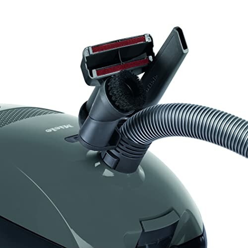 Vacuum cleaner with attached accessories