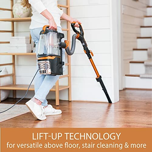 Person using a vacuum cleaner with lift-up technology for versatile cleaning.