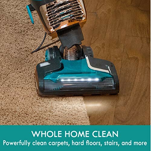 Vacuum cleaner cleaning carpet and hard floor