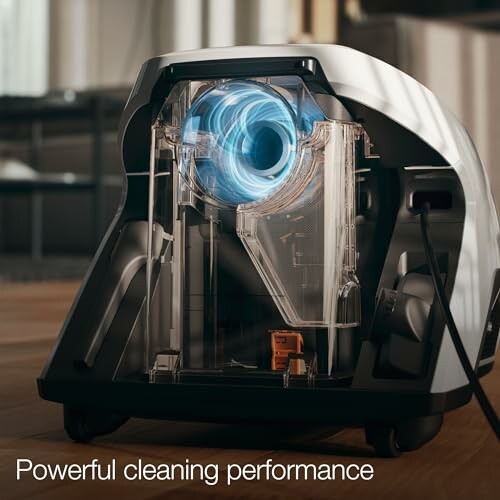 Transparent vacuum cleaner showcasing powerful cleaning performance.