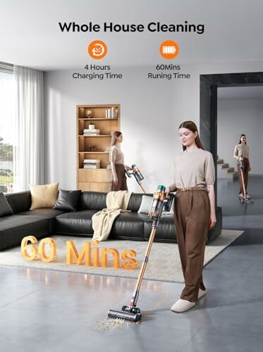 Person vacuuming modern living room with cordless vacuum cleaner.