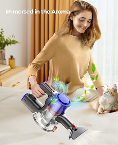 Woman using handheld vacuum cleaner near cat on bed.
